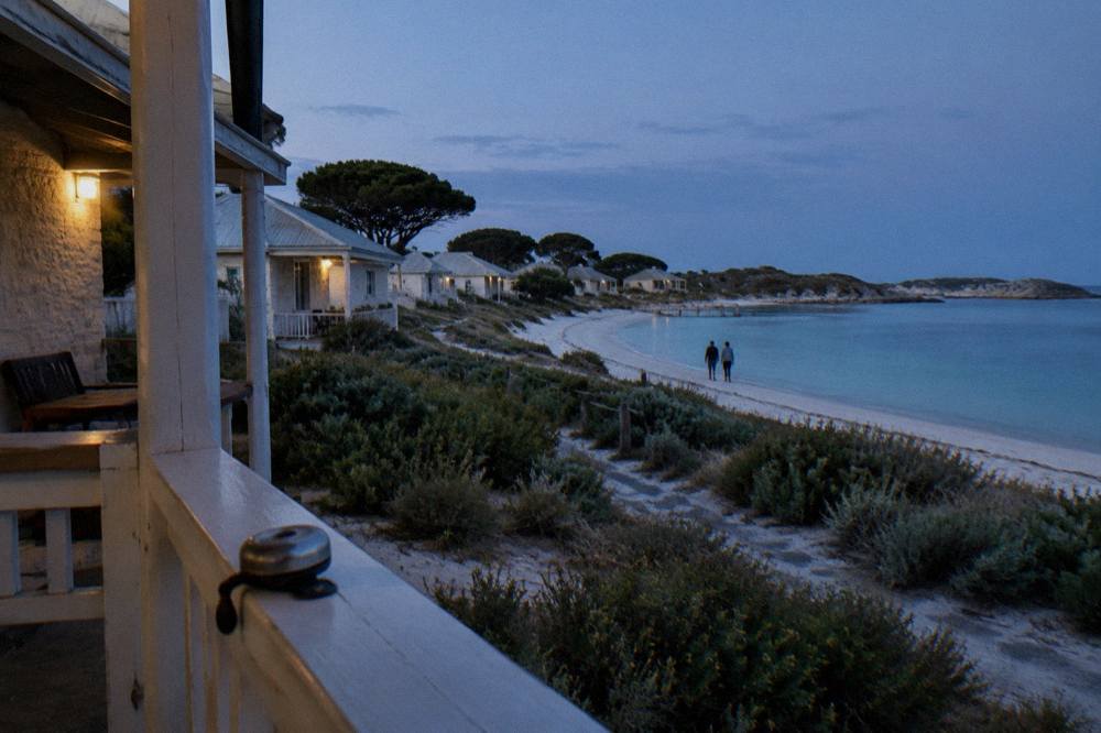 Quiet evening light over Thomson Bay settlement with heritage buildings and calm water