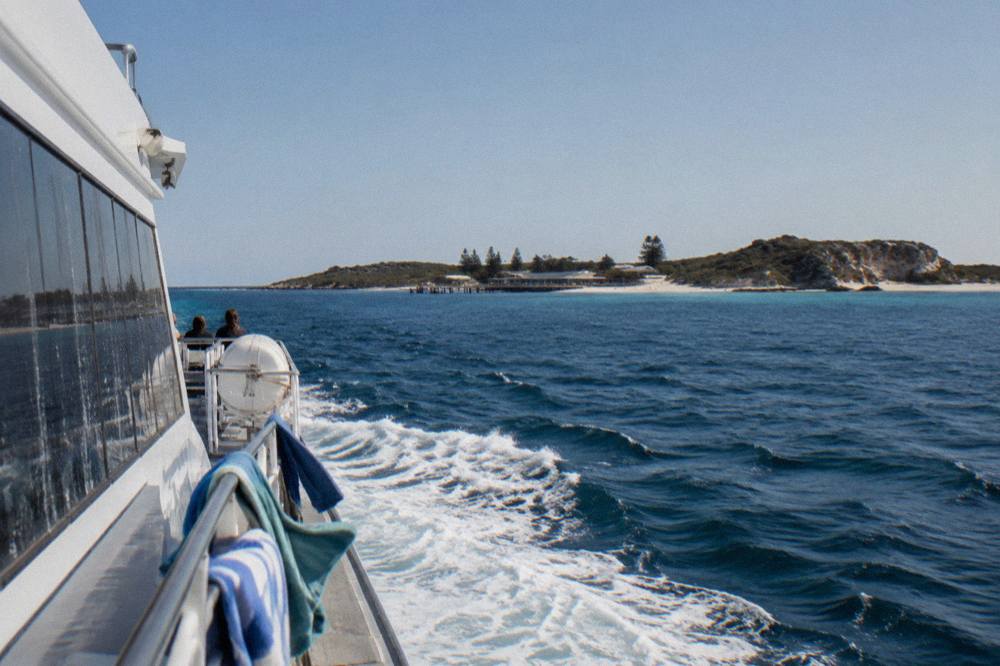 A fast ferry travelling across open water towards Rottnest Island